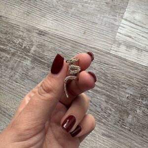 Gold snake ear cuff with gemstone detailing